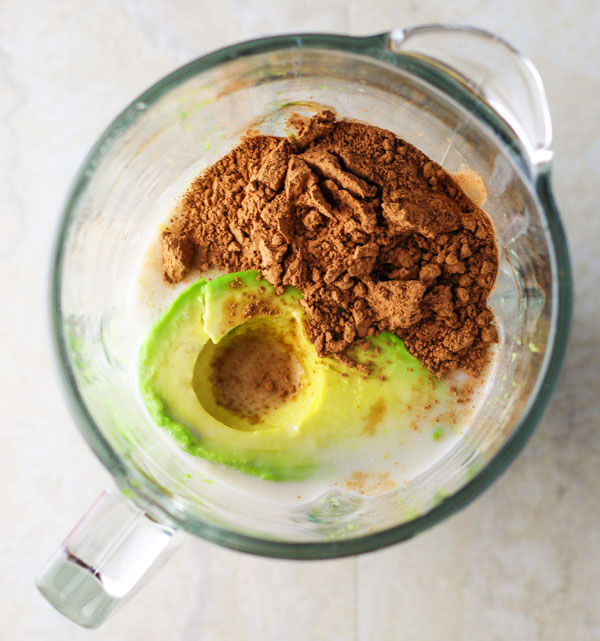 image of bluerries and oatmeal smoothie in a glass