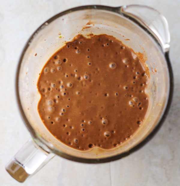 image of bluerries and oatmeal smoothie in a glass