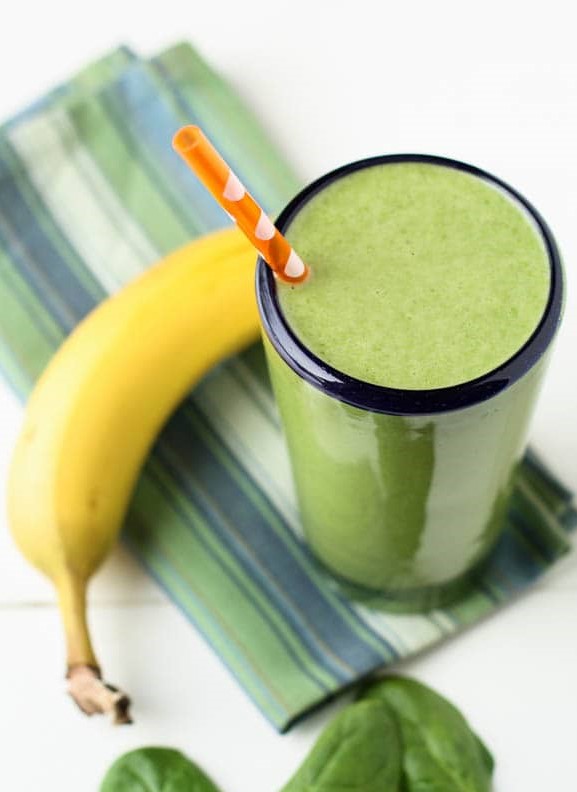 image of spinach and banana smoothie in a glass